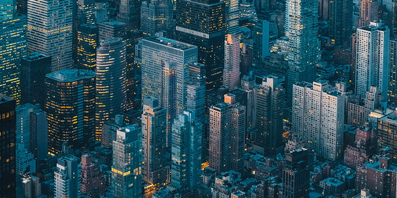 Aerial view of a city at dusk used in Australian Public M&A Deal Report 2026 Chapter Corporate Regulators and FIRB.