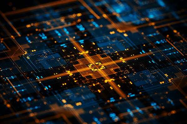 Three business professionals seated at a conference table in a modern office setting, engaged in discussion.
